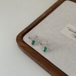Aurojewels Green Zirconia Ribbon Rope Knot Design Fashion Earrings