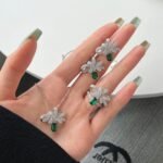 Aurojewels Green Zirconia Ribbon Rope Knot Design Fashion Earrings