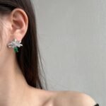Aurojewels Green Zirconia Ribbon Rope Knot Design Fashion Earrings