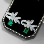 Aurojewels Green Zirconia Ribbon Rope Knot Design Fashion Earrings