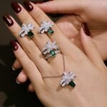 Aurojewels Green Zirconia Ribbon Rope Knot Design Fashion Earrings