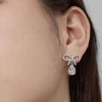 Aurojewels White Pear Drop Bow Design Earrings