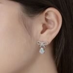 Aurojewels White Pear Drop Bow Design Earrings