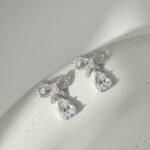 Aurojewels White Pear Drop Bow Design Earrings